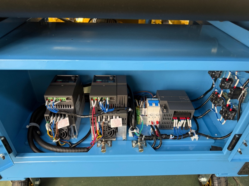 Sistema de control del transportador de carga/descarga modular