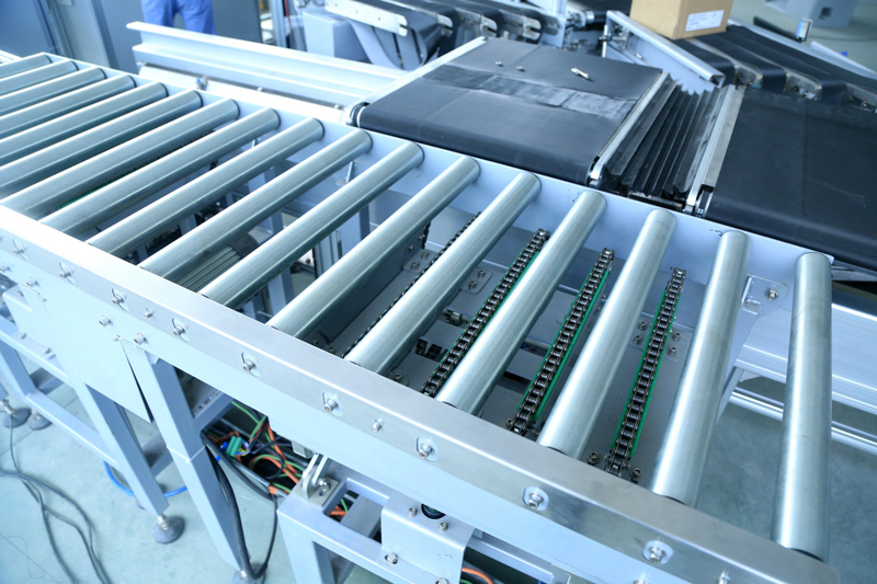 Transportador de transferencia de elevaci&oacute;n